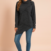 Lidia | Asymmetrical sweater with a decorative clasp