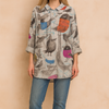 Lillian | | Loose-fitting shirt with a charming bird motif