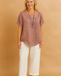 Liva | Asymmetrical blouse with decorative clasp