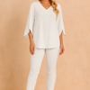 Lumi | V-neck blouse with slit on the sleeve